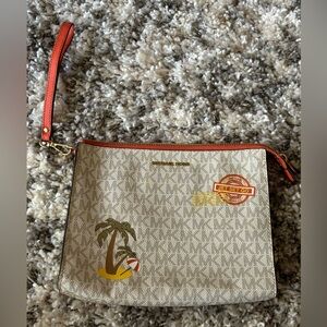 Michael Kors Cream and Orange Wristlet